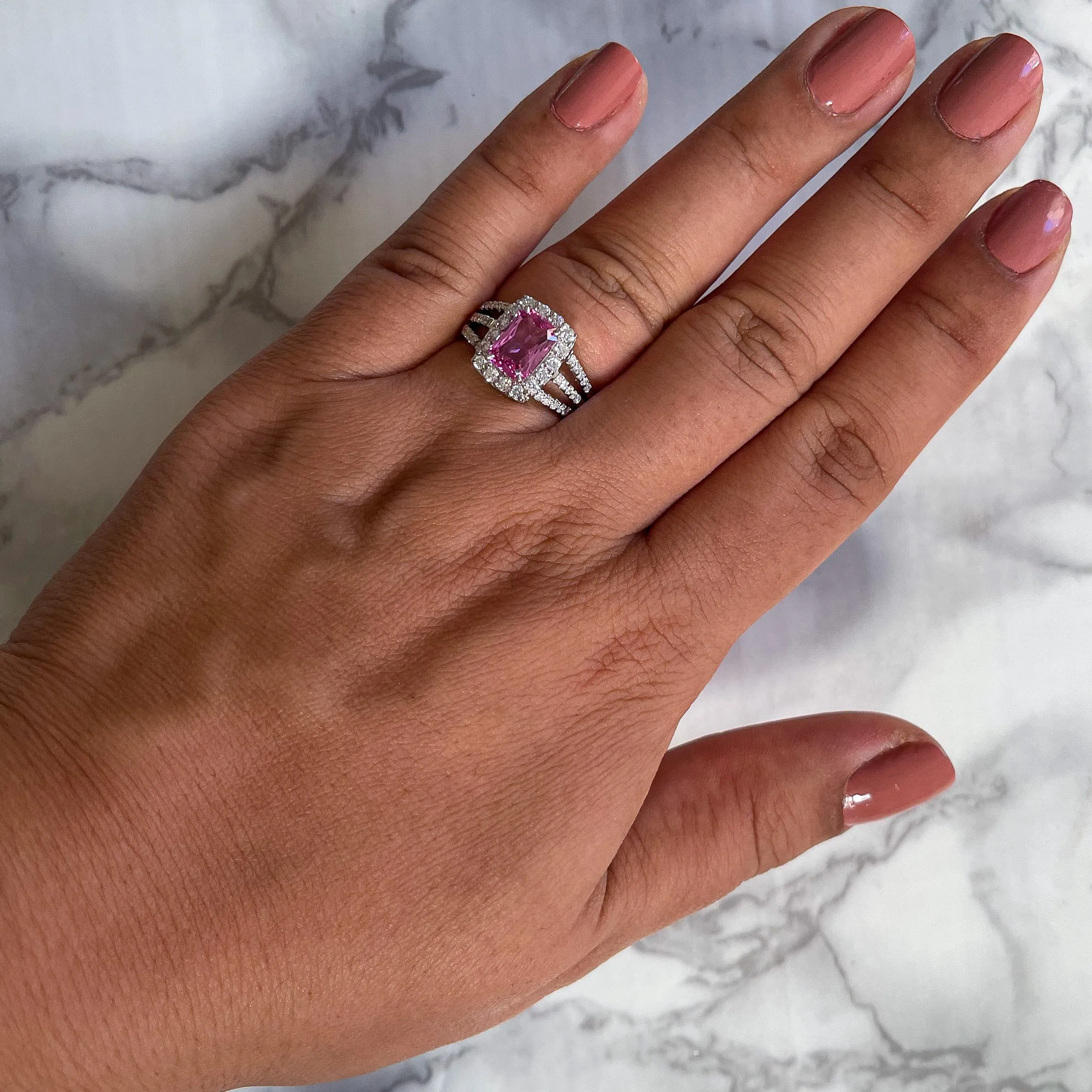 2.25ct Emerald Cut Pink Sapphire Ring with Diamond halo in 18K White Gold