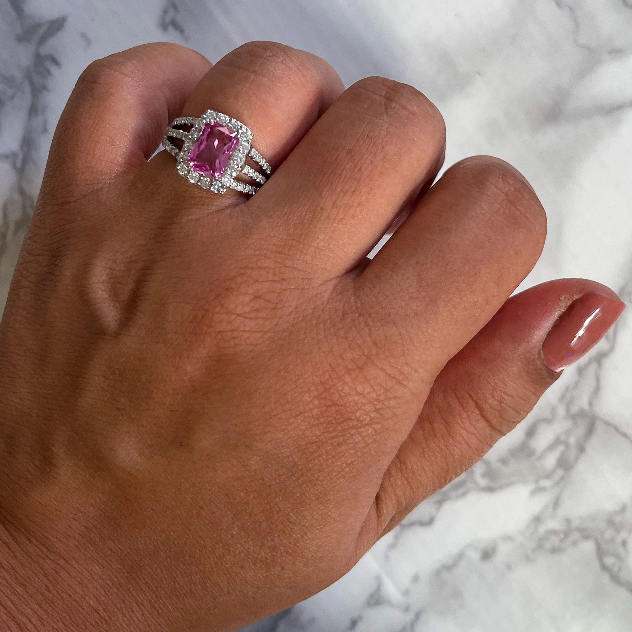 2.25ct Emerald Cut Pink Sapphire Ring with Diamond halo in 18K White Gold