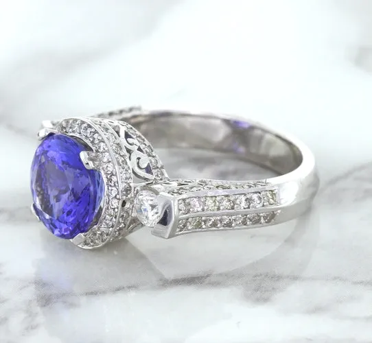 3.12ct Round Tanzanite Ring with Diamond Halo in 14K White Gold