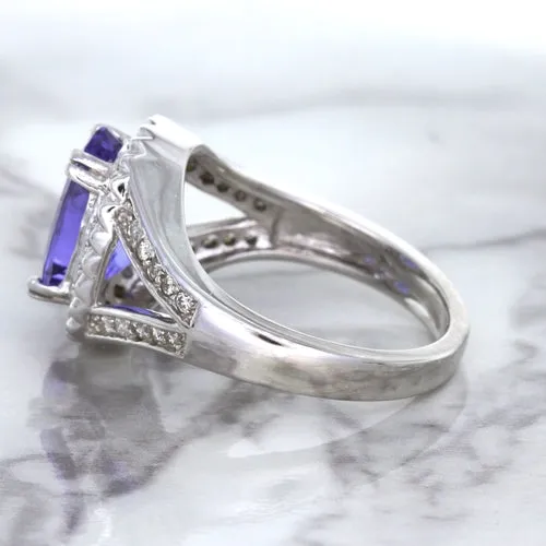 3.37ct Oval Tanzanite Ring with Diamond Halo in 14K White Gold