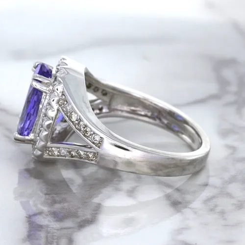 3.37ct Oval Tanzanite Ring with Diamond Halo in 14K White Gold