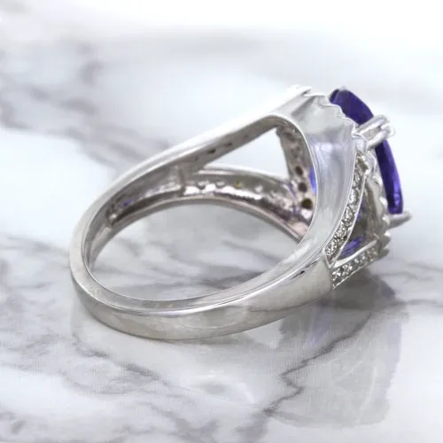 3.37ct Oval Tanzanite Ring with Diamond Halo in 14K White Gold
