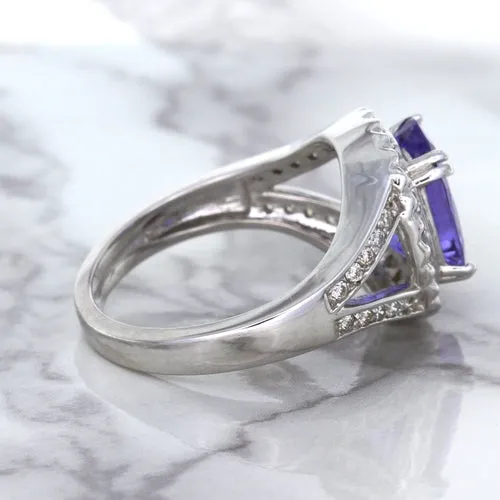 3.37ct Oval Tanzanite Ring with Diamond Halo in 14K White Gold