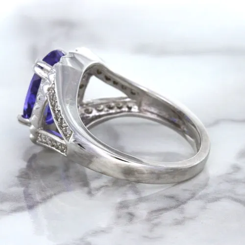 3.37ct Oval Tanzanite Ring with Diamond Halo in 14K White Gold