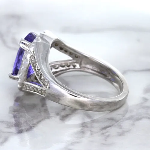 3.37ct Oval Tanzanite Ring with Diamond Halo in 14K White Gold