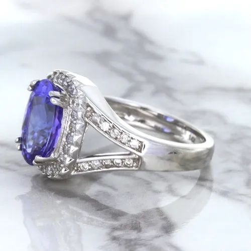 3.37ct Oval Tanzanite Ring with Diamond Halo in 14K White Gold