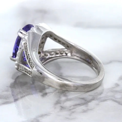 3.37ct Oval Tanzanite Ring with Diamond Halo in 14K White Gold