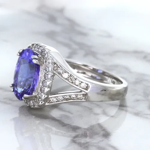 3.37ct Oval Tanzanite Ring with Diamond Halo in 14K White Gold