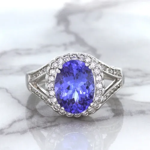 3.37ct Oval Tanzanite Ring with Diamond Halo in 14K White Gold
