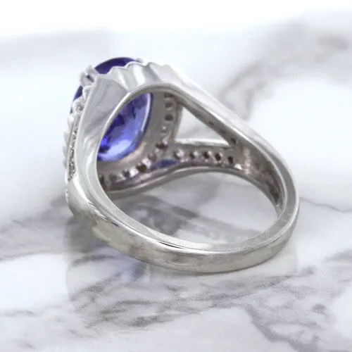 3.37ct Oval Tanzanite Ring with Diamond Halo in 14K White Gold