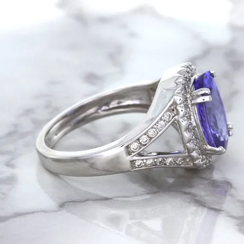 3.37ct Oval Tanzanite Ring with Diamond Halo in 14K White Gold
