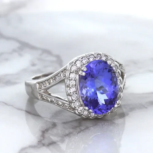 3.37ct Oval Tanzanite Ring with Diamond Halo in 14K White Gold