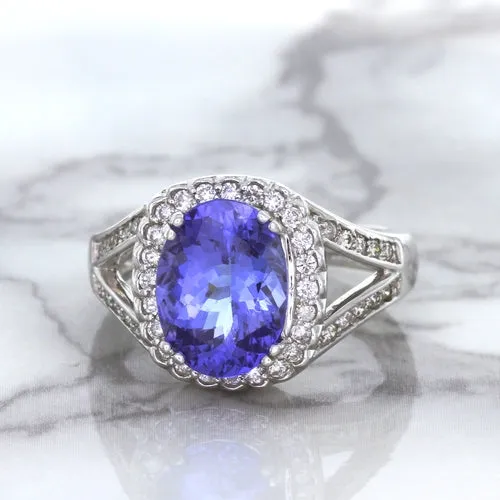 3.37ct Oval Tanzanite Ring with Diamond Halo in 14K White Gold