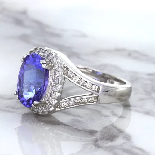 3.37ct Oval Tanzanite Ring with Diamond Halo in 14K White Gold