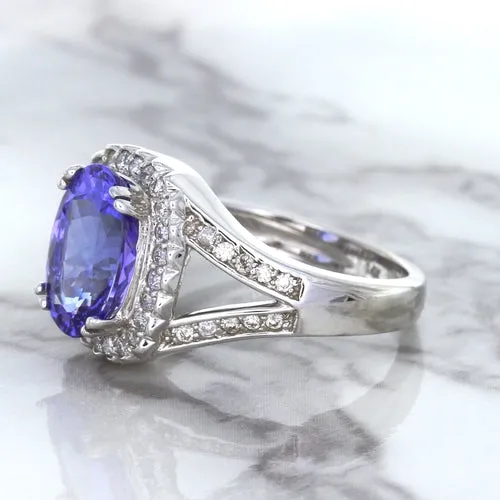 3.37ct Oval Tanzanite Ring with Diamond Halo in 14K White Gold
