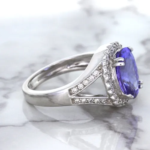 3.37ct Oval Tanzanite Ring with Diamond Halo in 14K White Gold