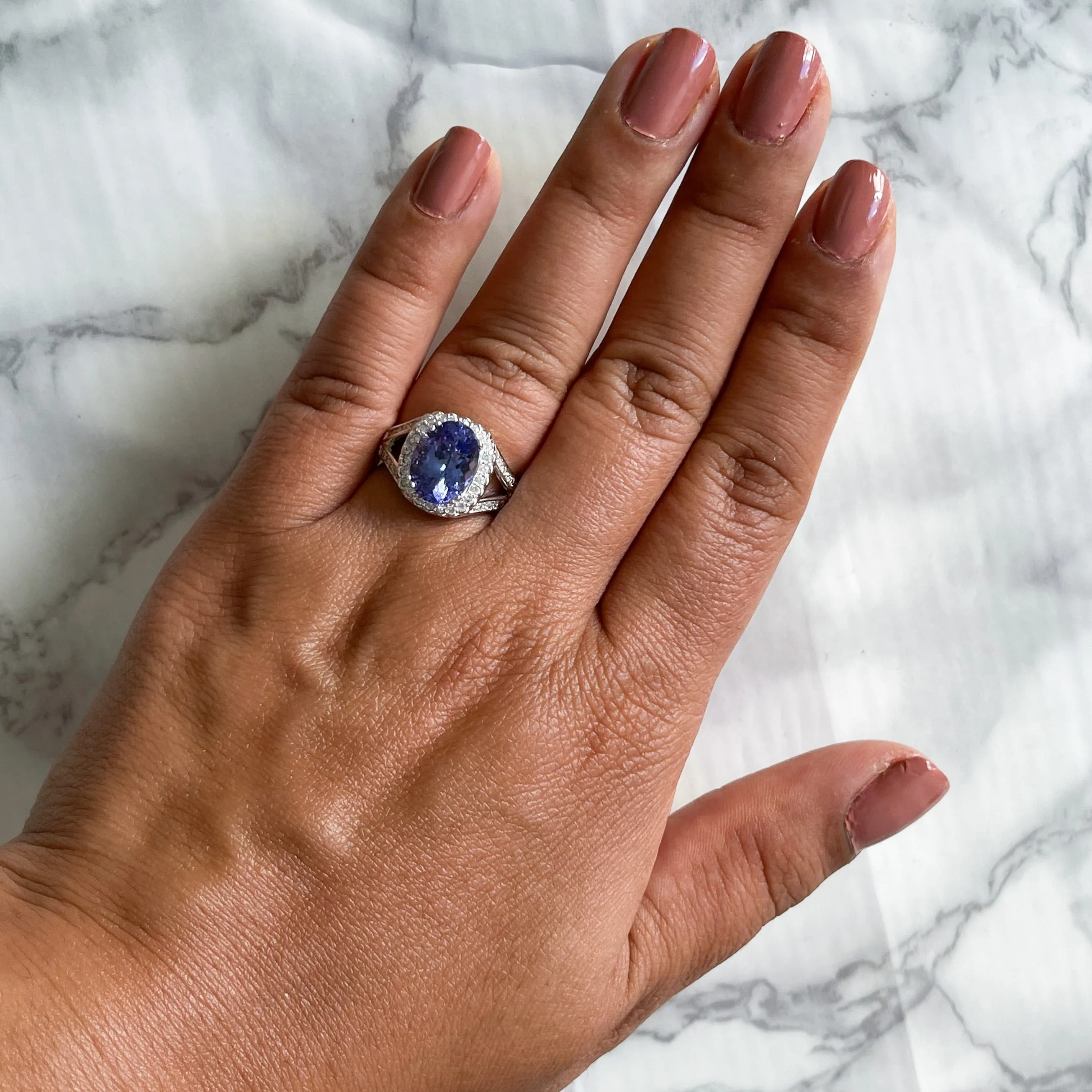 3.37ct Oval Tanzanite Ring with Diamond Halo in 14K White Gold