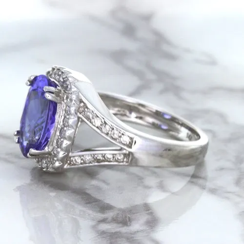 3.37ct Oval Tanzanite Ring with Diamond Halo in 14K White Gold