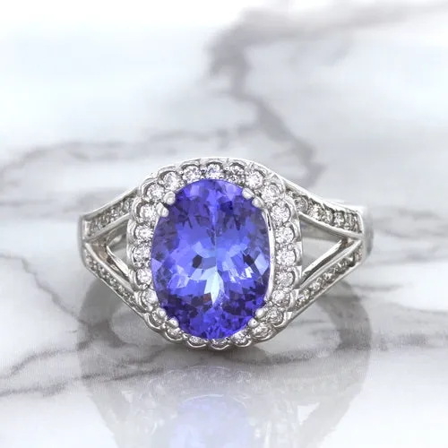 3.37ct Oval Tanzanite Ring with Diamond Halo in 14K White Gold