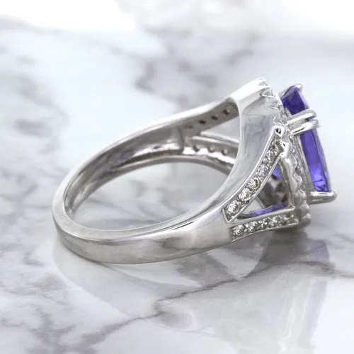 3.37ct Oval Tanzanite Ring with Diamond Halo in 14K White Gold