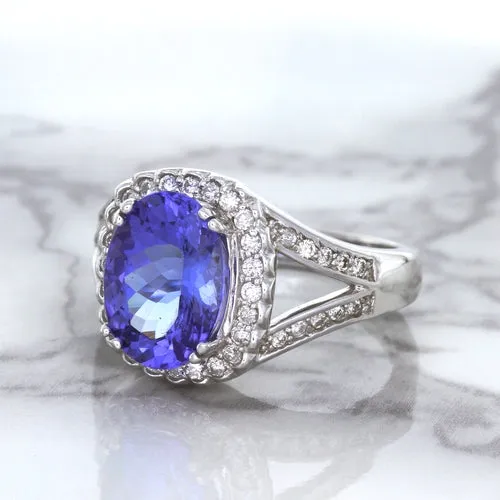 3.37ct Oval Tanzanite Ring with Diamond Halo in 14K White Gold