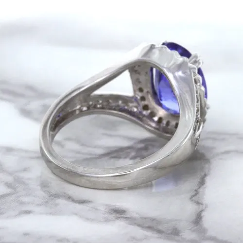 3.37ct Oval Tanzanite Ring with Diamond Halo in 14K White Gold