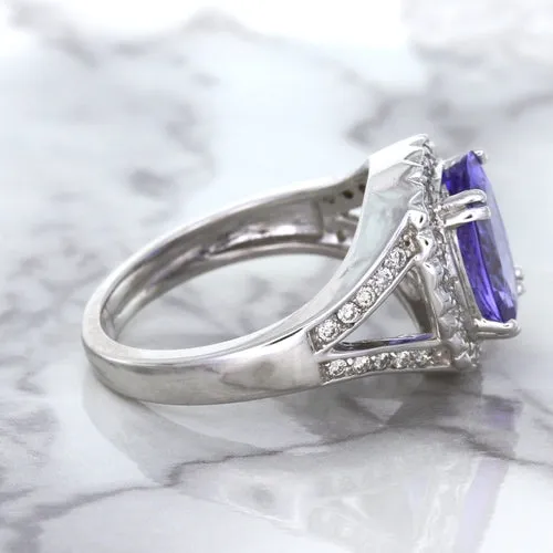 3.37ct Oval Tanzanite Ring with Diamond Halo in 14K White Gold