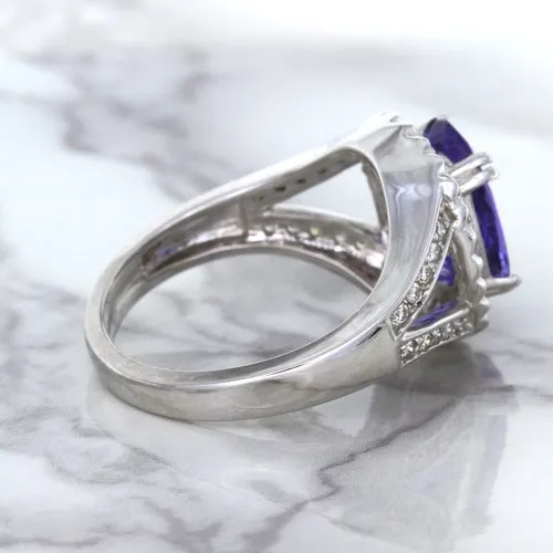 3.37ct Oval Tanzanite Ring with Diamond Halo in 14K White Gold