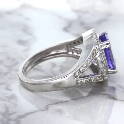 3.37ct Oval Tanzanite Ring with Diamond Halo in 14K White Gold