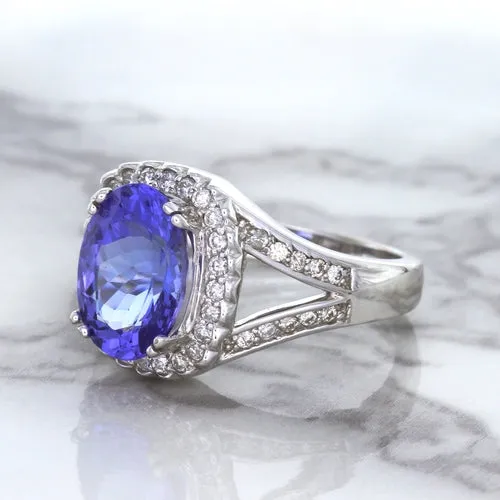 3.37ct Oval Tanzanite Ring with Diamond Halo in 14K White Gold