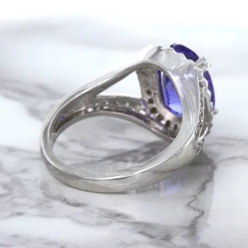 3.37ct Oval Tanzanite Ring with Diamond Halo in 14K White Gold