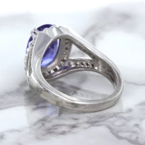 3.37ct Oval Tanzanite Ring with Diamond Halo in 14K White Gold