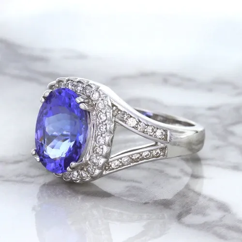 3.37ct Oval Tanzanite Ring with Diamond Halo in 14K White Gold