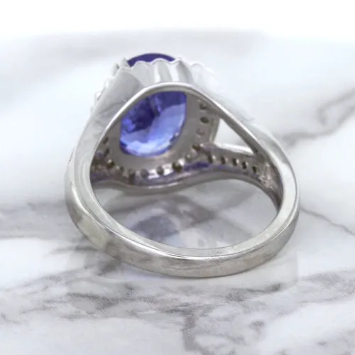 3.37ct Oval Tanzanite Ring with Diamond Halo in 14K White Gold
