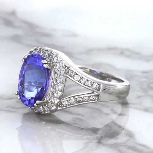 3.37ct Oval Tanzanite Ring with Diamond Halo in 14K White Gold