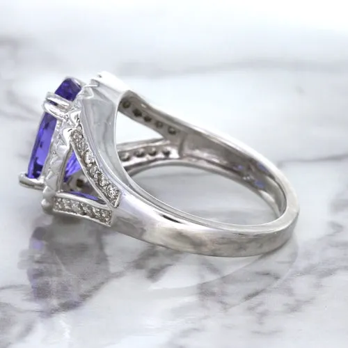 3.37ct Oval Tanzanite Ring with Diamond Halo in 14K White Gold