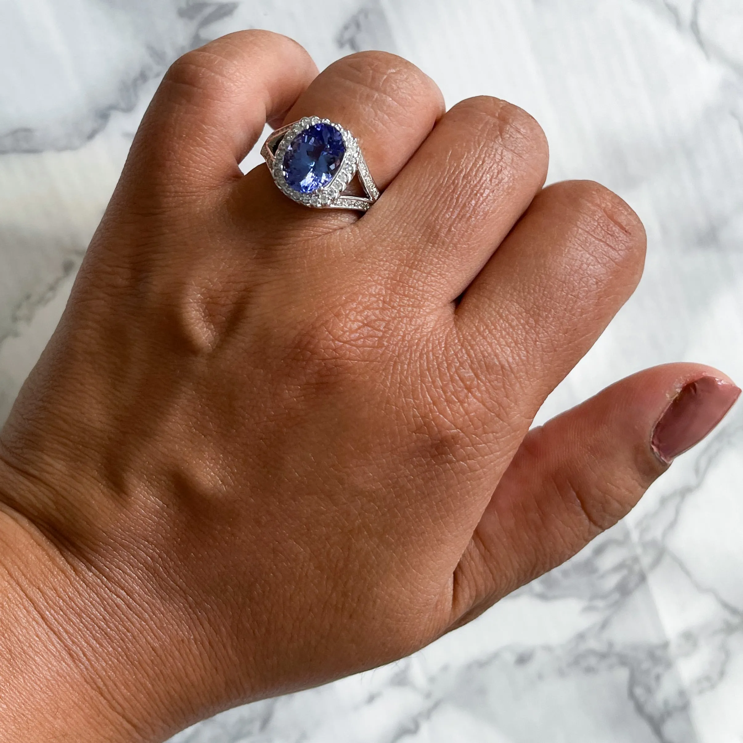 3.37ct Oval Tanzanite Ring with Diamond Halo in 14K White Gold