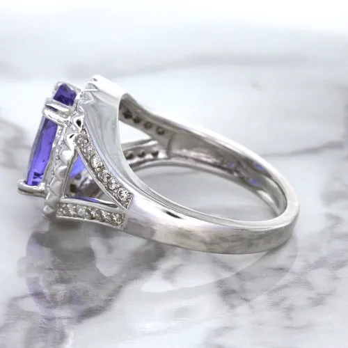 3.37ct Oval Tanzanite Ring with Diamond Halo in 14K White Gold