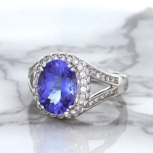 3.37ct Oval Tanzanite Ring with Diamond Halo in 14K White Gold