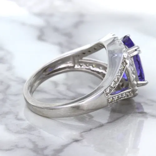 3.37ct Oval Tanzanite Ring with Diamond Halo in 14K White Gold