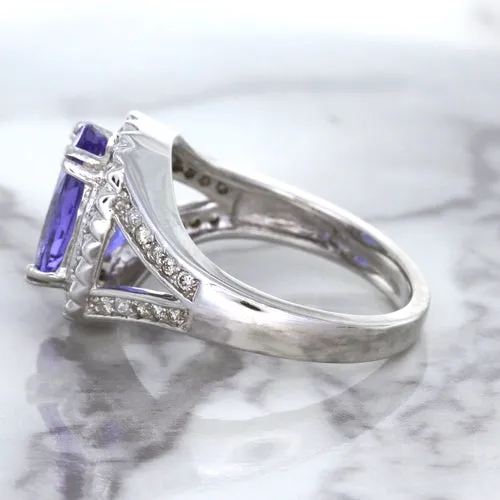 3.37ct Oval Tanzanite Ring with Diamond Halo in 14K White Gold