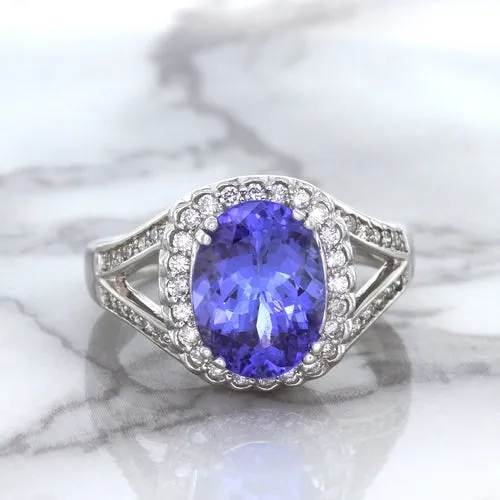 3.37ct Oval Tanzanite Ring with Diamond Halo in 14K White Gold