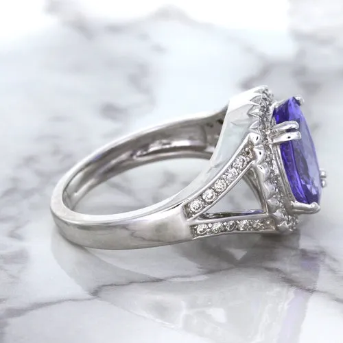 3.37ct Oval Tanzanite Ring with Diamond Halo in 14K White Gold