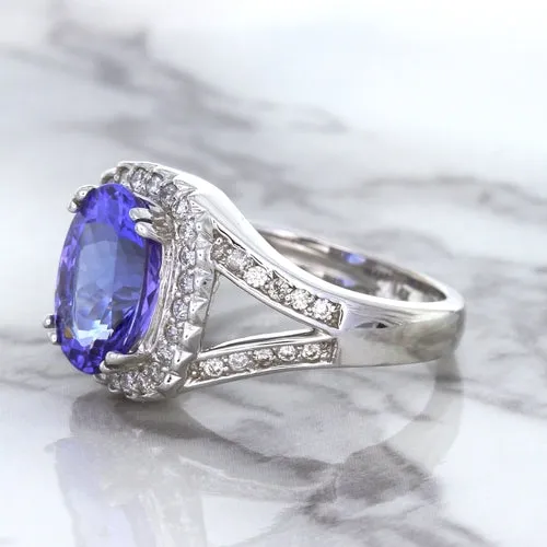 3.37ct Oval Tanzanite Ring with Diamond Halo in 14K White Gold