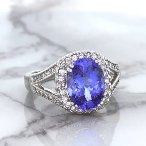 3.37ct Oval Tanzanite Ring with Diamond Halo in 14K White Gold
