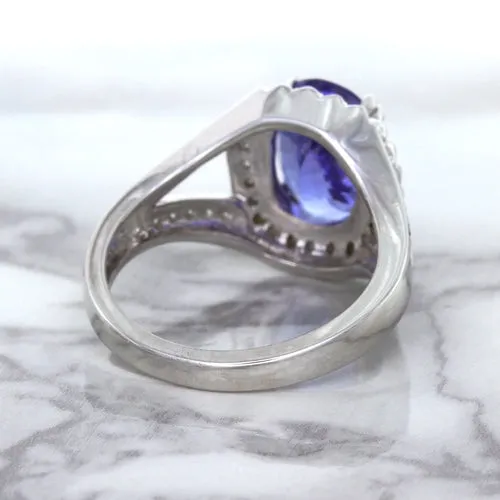 3.37ct Oval Tanzanite Ring with Diamond Halo in 14K White Gold