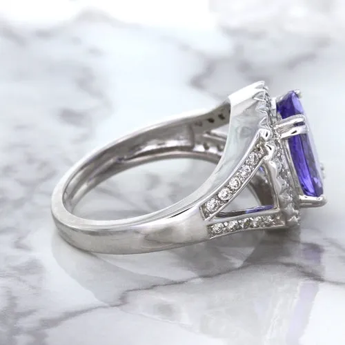 3.37ct Oval Tanzanite Ring with Diamond Halo in 14K White Gold