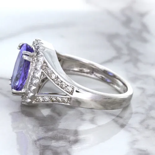 3.37ct Oval Tanzanite Ring with Diamond Halo in 14K White Gold