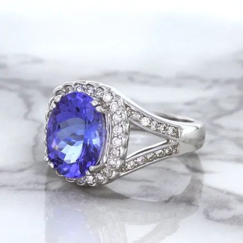 3.37ct Oval Tanzanite Ring with Diamond Halo in 14K White Gold