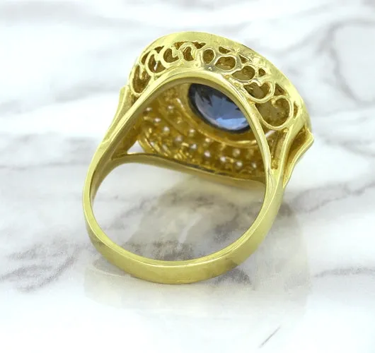 4.23ct Oval Blue Spinel Ring with Double Diamond Halo in 14K Yellow Gold